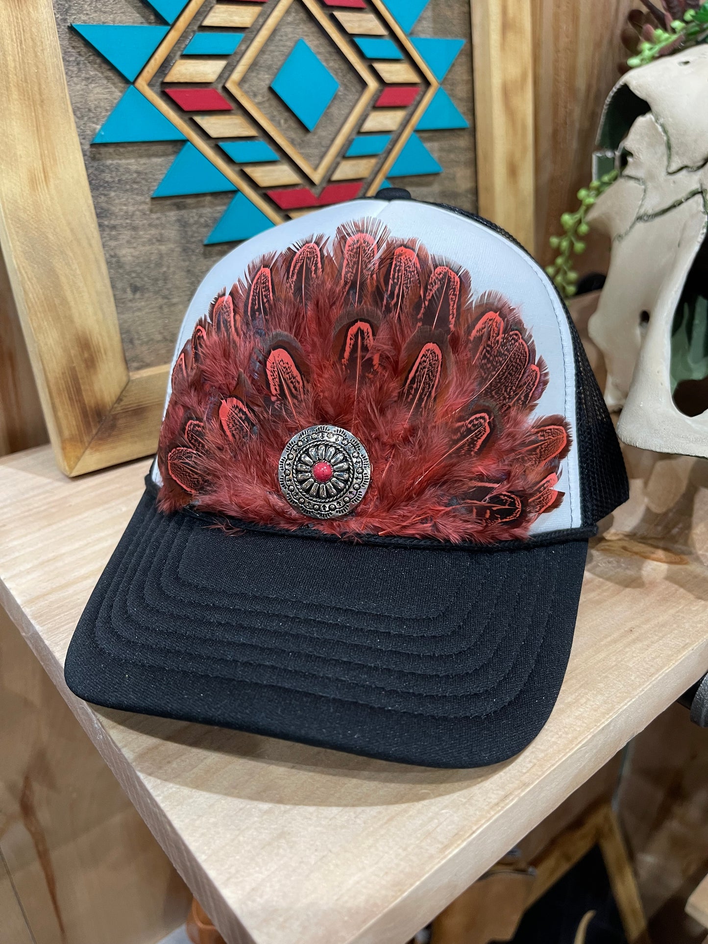 Red feather black and white trucker cap