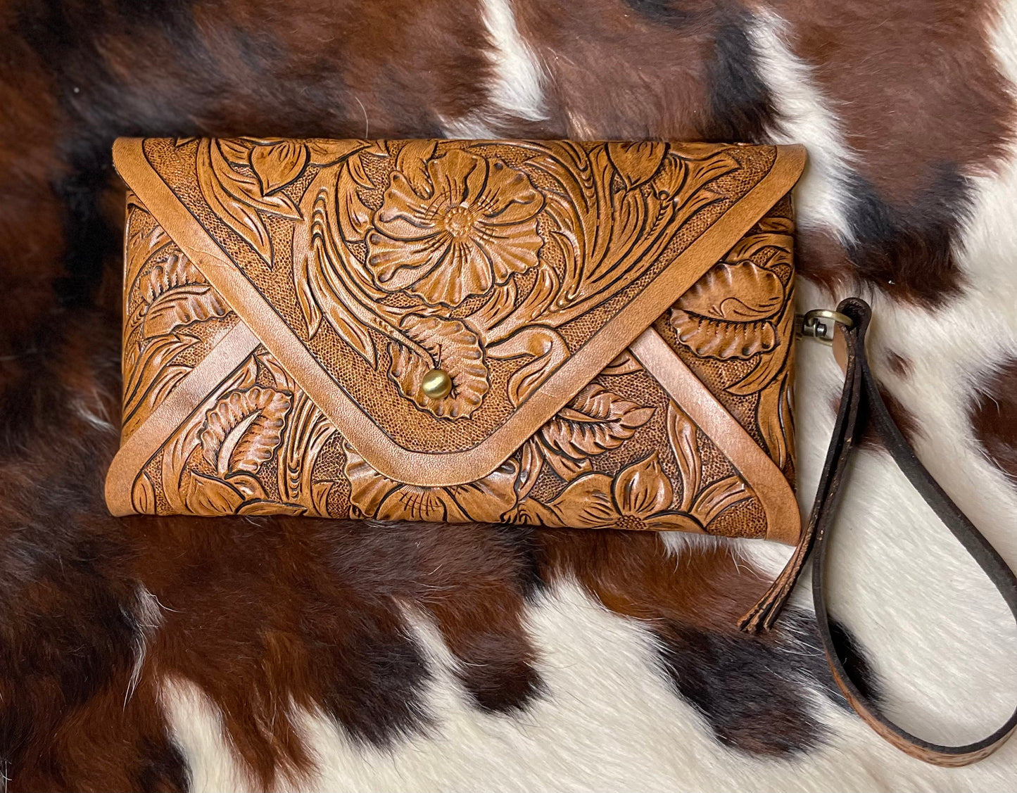 Tooled leather clutch purse