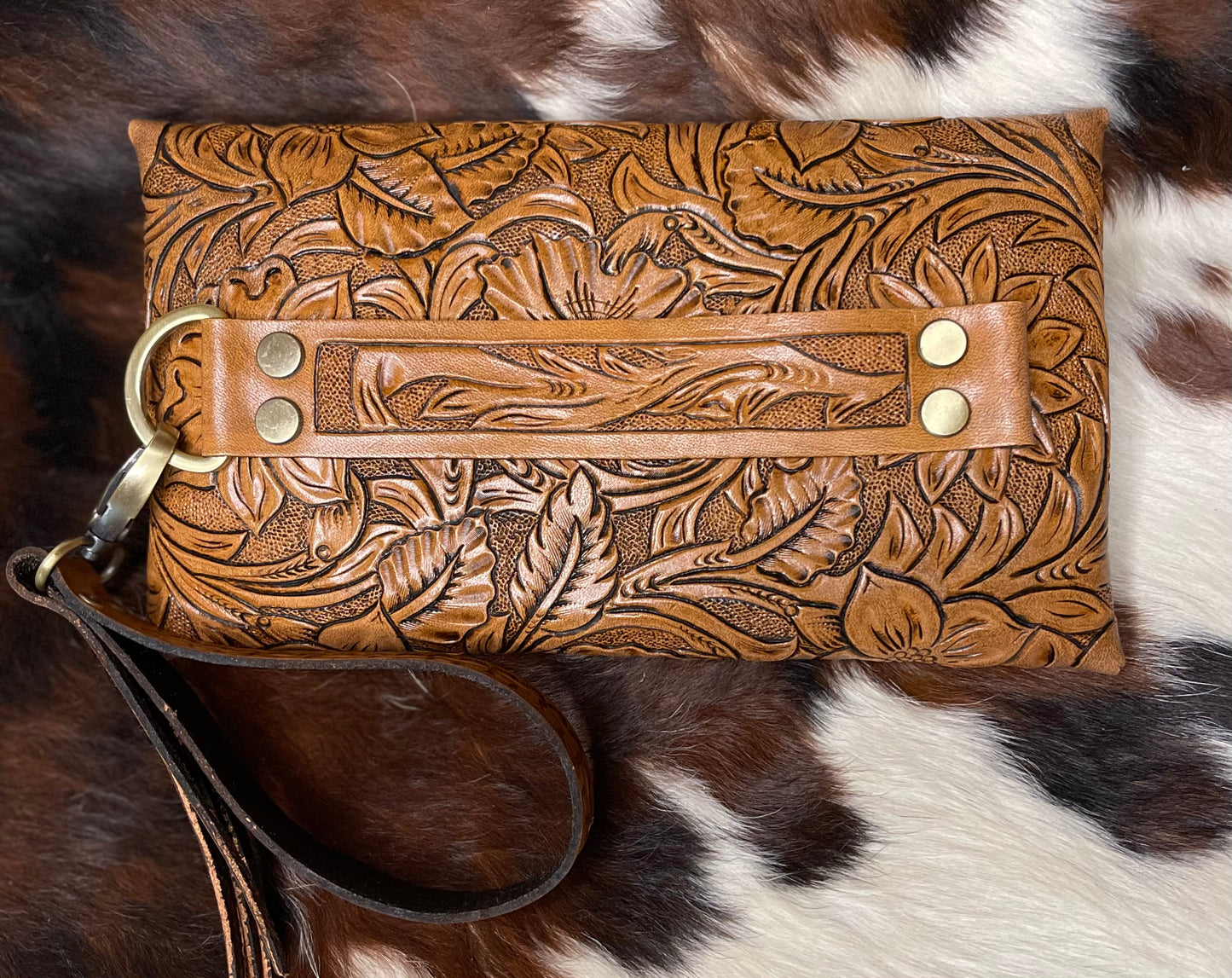 Tooled leather clutch purse